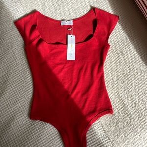 Gil Rodriguez bodysuit